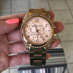 Michael Kors rose gold women’s watch